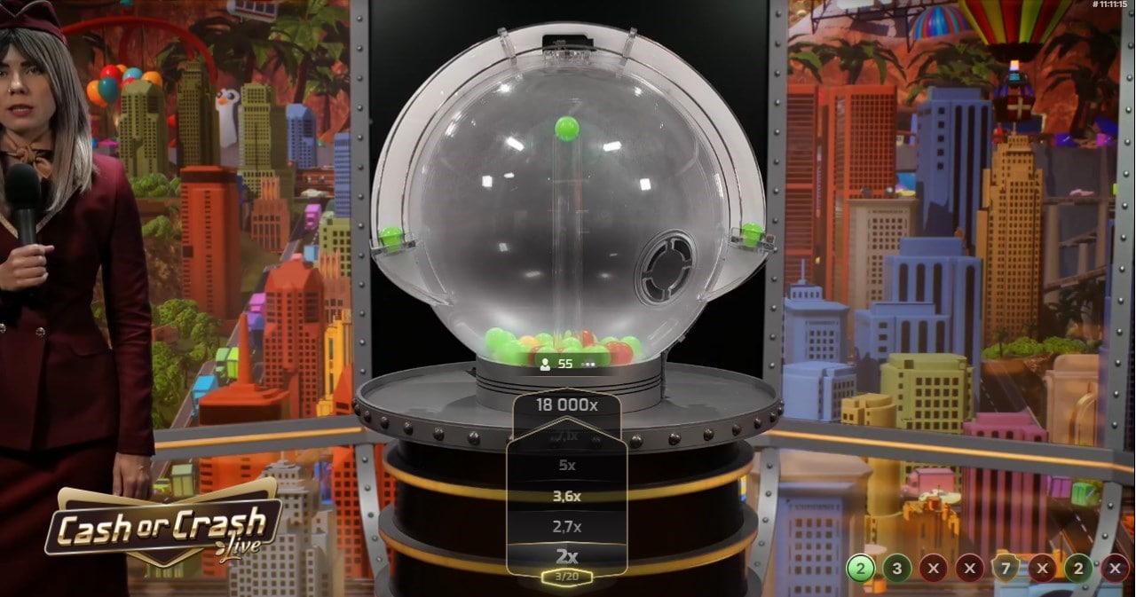 Cash or Crash game machine with a transparent sphere containing colored balls, showing multiplier levels up to 18,000x against a vibrant cartoon city backdrop